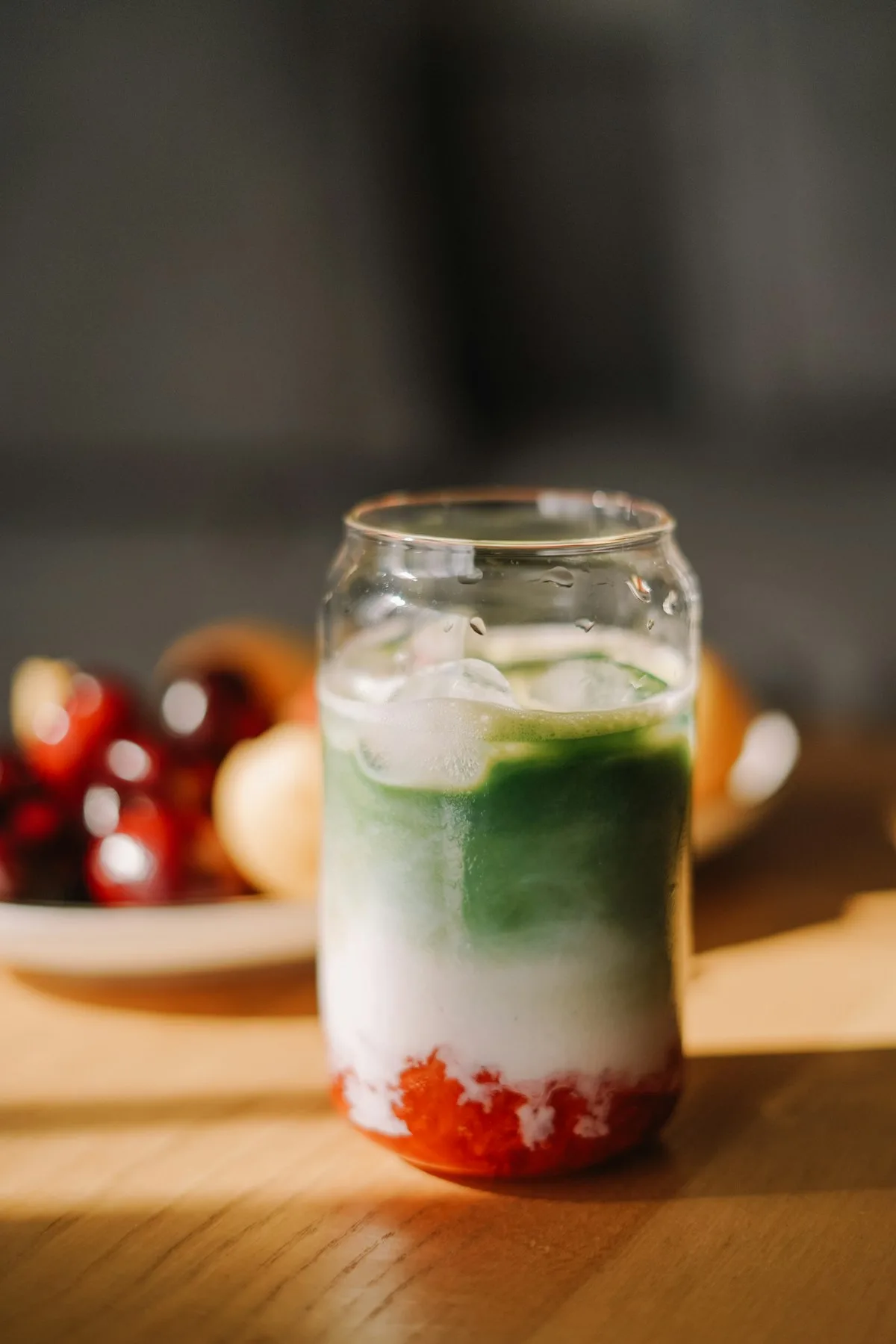 Strawberry matcha latte over ice