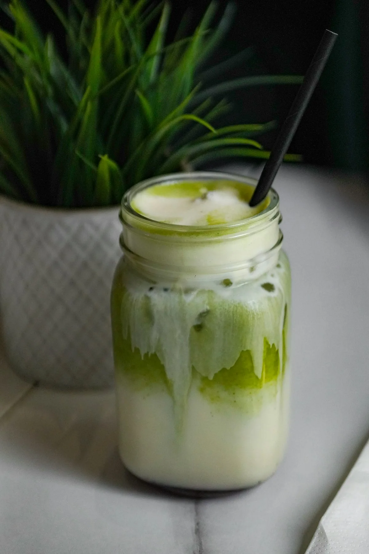 Iced matcha latte over ice